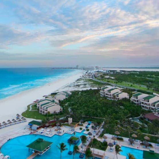 Sandy beaches and swimming pool at a seaside holiday resort