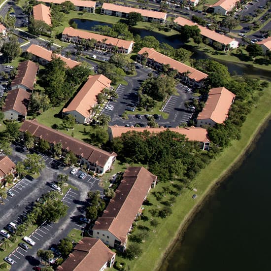 Looking down on the roofs of houses within a community housing 