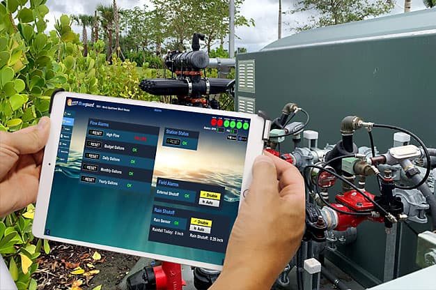 Flowguard dashboard being monitored on a tablet device infront of an Irrigation Pump Station