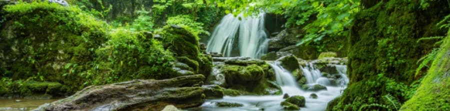 Water falling between rocks on a river