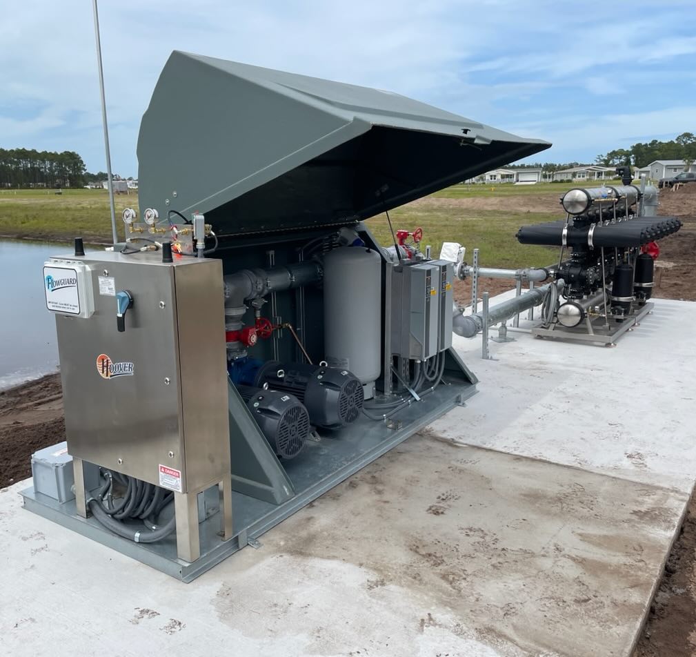 A Hoover Irrigation Pump Station with the lid lifted up showing the Pumps