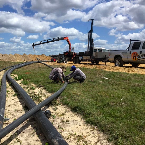 A long pipeline being setup by the Hoover team on location