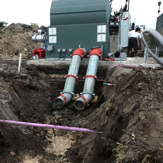 Irrigation Pump Station pipes in mid installation into the ground